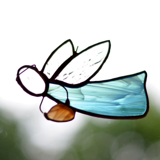 Boží posel s nebeskými dary v dlaních - tři varianty