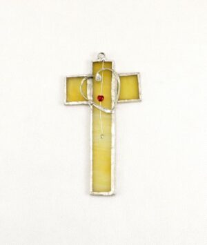 Křížek z opálového skla – medový, s perličkou